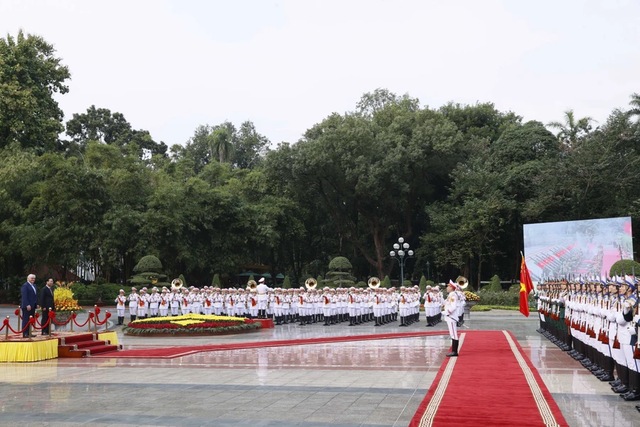 Le Président organise une cérémonie officielle de bienvenue pour son homologue allemand - Ảnh 3.